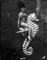 Bonita Colson posing on Bubbles the seahorse at Weeki Wachee Springs